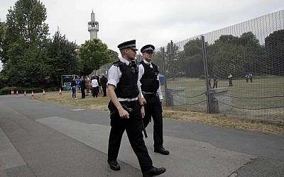 Illustrative. British police patrolling in London, July 12, 2018. (Luca Bruno/AP)