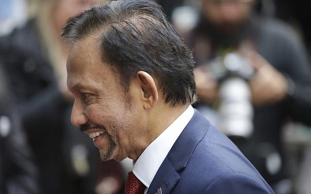 Sultan Haji Hassanal Bolkiah of Brunei arrives for an EU-ASEM summit in Brussels, Friday, Oct. 19, 2018.  (AP Photo/Olivier Matthys)