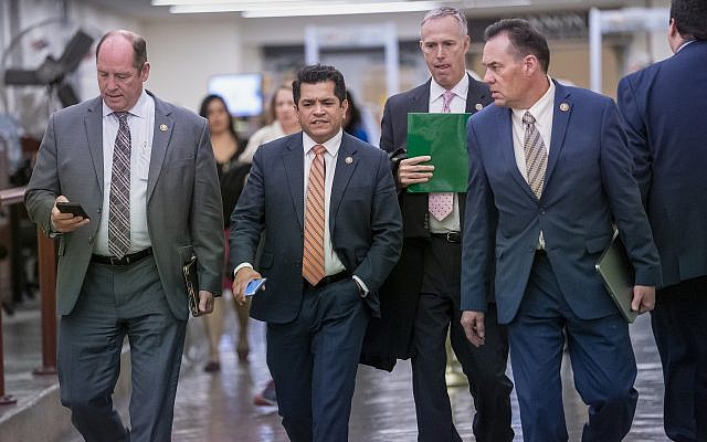 Members of the House walk to the chamber for a vote on an anti-hate resolution at the Capitol in Washington, Thursday, March 7, 2019. (AP/J. Scott Applewhite)