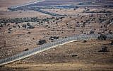 View of the border fence with Syria from the Israeli side in the Golan Heights, on July 23, 2018. (David Cohen/Flash90)