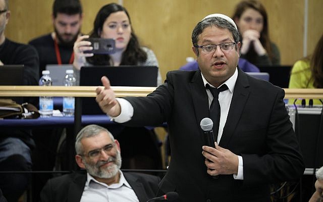 Members of the extremist Otzma Yehudit party, chairman Michael Ben Ari, left, and number two Itamar Ben Gvir, right, attend a meeting of the Central Elections Committee in the Knesset on March 6, 2019 to discuss appeals calling for Ben Ari's disqualification from running in the April Knesset elections. (Noam Revkin Fenton/Flash90)