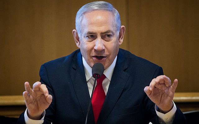 Prime Minister Benjamin Netanyahu speaks at a signing ceremony for an agreement to build new apartments in Jerusalem on March 11, 2019. (Aharon Krohn/Flash90)