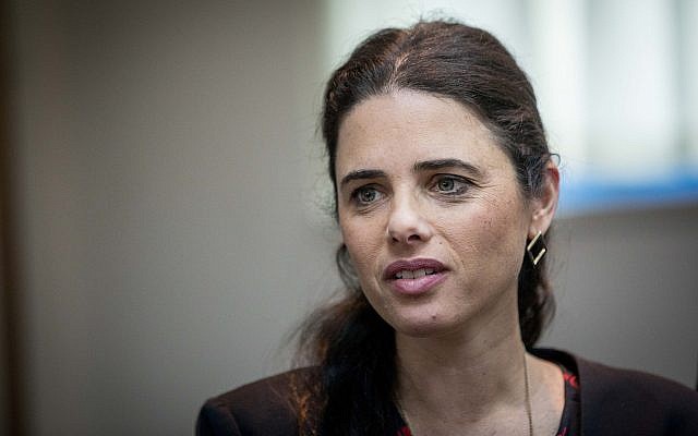 Justice Minister Ayelet Shaked is presented with the state comptroller's annual report at the Ministry of Justice in Jerusalem on March 24, 2019. (Yonatan Sindel/Flash90)