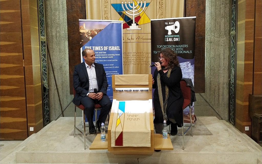 Education and Diaspora Affairs Minister Naftali Bennett, left, speaks with The Times of Israel's Jewish World editor Amanda Borschel-Dan at an English-language event, March 27, 2019. (Yaakov Schwartz/ Times of Israel)