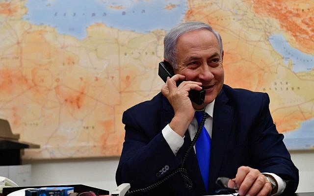 Illustrative: Prime Minister Benjamin Netanyahu speaks on the phone, March 21, 2019 (Kobi Gideon/GPO)