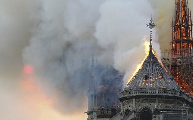 Flames burn the roof of the landmark Notre Dame Cathedral in central Paris on April 15, 2019, during a fire.  (FRANCOIS GUILLOT / AFP)