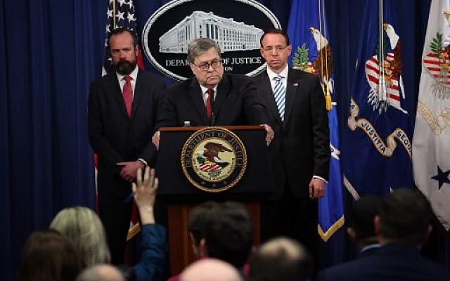 US Attorney General William Barr (C) takes questions about the release of the redacted version of the Mueller Report at the Department of Justice April 18, 2019 in Washington, DC. Also pictured (L-R) are Ed OCallaghan, Acting Principal Associate Deputy Attorney General and Deputy Attorney General Rod Rosenstein. (Win McNamee/Getty Images/AFP)