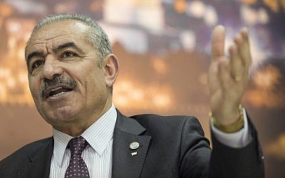Palestinian Authority Prime Minister Mohammad Shtayyeh at his office in the West Bank city of Ramallah, April 16, 2019. (AP Photo/ Nasser Nasser)