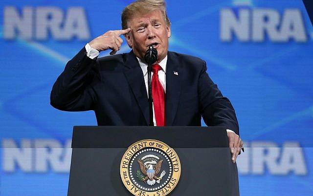 President Donald Trump speaks at the National Rifle Association Institute for Legislative Action Leadership Forum in Lucas Oil Stadium in Indianapolis, Friday, April 26, 2019. (AP Photo/Michael Conroy)