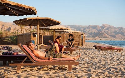 Israelis enjoy the beach of Paradis Sweir, a desert resort located on the Red Sea shore, South Sinai, Egypt, during the Jewish holiday of Sukkot, October 15, 2016. (Johanna Geron/Flash90)