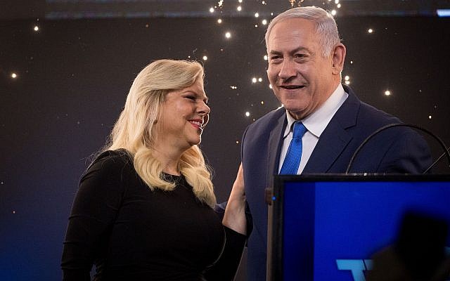 Prime Minister Benjamin Netanyahu celebrates with his wife Sara before addressing Likud supporters as the the results of the Israeli general elections are announced, at the party headquarters in Tel Aviv, in the early hours of April 10, 2019. (Yonatan Sindel/FLASH90)