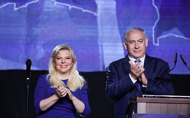 Prime Minister Benjamin Netanyahu (R) and his wife Sara at an event of the Likud party in Jerusalem, April 16, 2019. (Hadas Parush/Flash90)