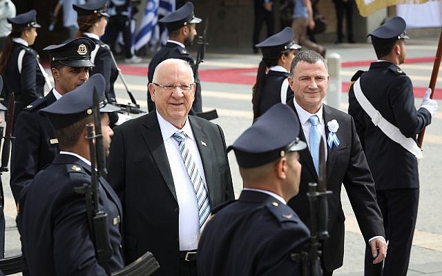 President Reuven Rivlin and Knesset Speaker Yuli Edelstein inspect an honor guard during a swearing-in ceremony for the new Knesset, April 30, 2019. (Noam Revkin Fenton/Flash90)