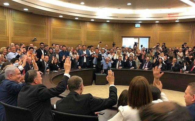 Likud MKs vote to back then-incumbent Knesset speaker Yuli Edelstein for another term in the position, during a faction meeting at the Knesset, on April 30, 2019. (Raoul Wootliff/Times of Israel)