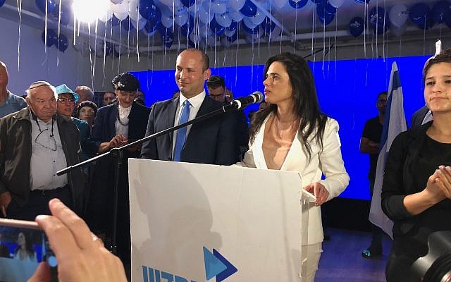 New Right co-leaders Ayelet Shaked and Naftali Bennett address supporters at their campaign headquarters in Bnei Brak at the end of election day, April 9, 2019. (Jacob Magid/Times of Israel)