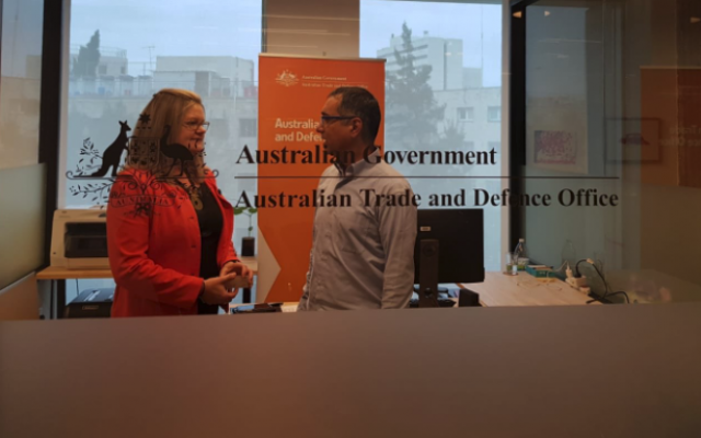 An Australian diplomat speaks with an Israeli colleague at Australia's new Defence and Trade Office in Jerusalem (Twitter)