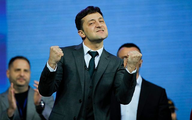 Volodymyr Zelensky, Ukrainian actor and candidate reacts after debates between in the weekend presidential run-off at the Olympic stadium in Kiev, Ukraine, April 19, 2019. (AP Photo/Vadim Ghirda)