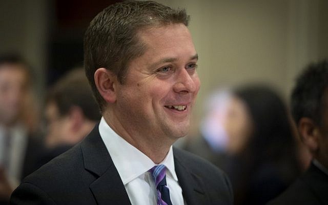 Andrew Scheer, leader of the Conservative Party of Canada, smiles during an event at the Montreal Council on Foreign Relations (MCFR), at the Marriott Chateau Champlain in Montreal on May 7, 2019. (Photo by Sebastien St-Jean / AFP)