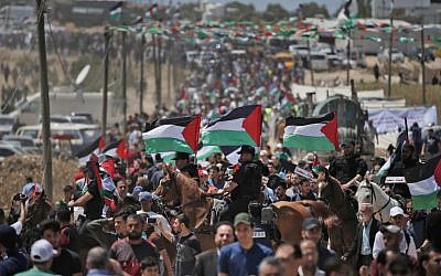 Palestinian demonstrators gather east of Gaza City in the Gaza Strip on May 15, 2019, during a protest marking 71st anniversary of the "Nakba," or "Catastrophe," in 1948. (Mahmud Hams/AFP)