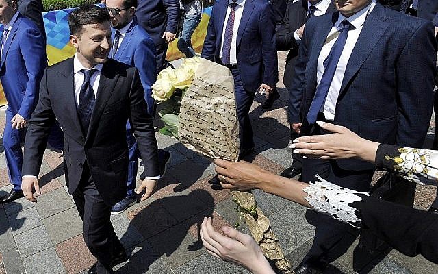 Ukraine's President Volodymyr Zelensky is greeted by supporters as he leaves his inauguration ceremony at the parliament in Kiev on May 20, 2019. (Sergei Chuzavkov/AFP)
