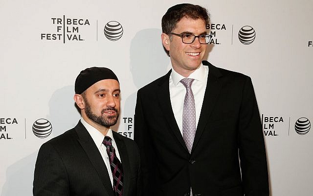 Khalid Latif, executive director of the Islamic Center at NYU, left, and Rabbi Yehuda Sarna, executive director of the university's Bronfman Center for Jewish Student Life, attend the Tribeca Film Festival in New York City, April 17, 2014. (Emal Countess/Getty Images for the 2014 Tribeca Film Festival via JTA)
