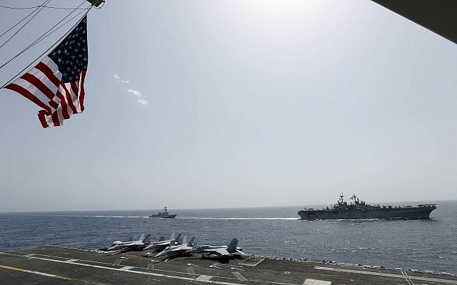 American navy ships USS Kearsarge  and USS Bainbridge deployed alongside the aircraft carrier USS Abraham Lincoln in the Gulf waters near Iran, May 17, 2019 (MCSN Michael S. Singley, US Navy)