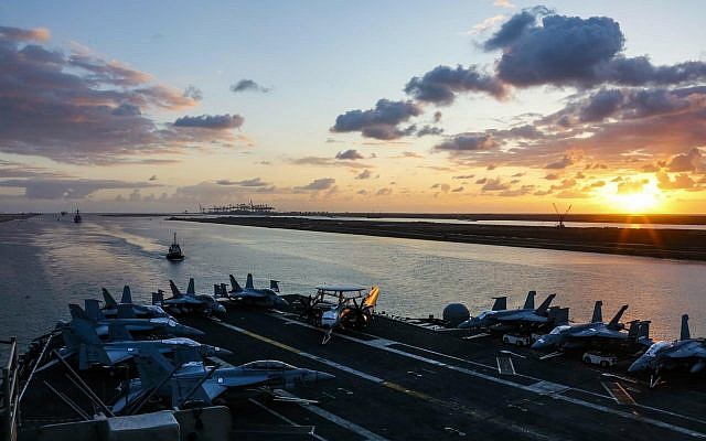 In this May 9, 2019 photo released by the US Navy, the Nimitz-class aircraft carrier USS Abraham Lincoln transits the Suez Canal in Egypt. (Mass Communication Specialist Seaman Dan Snow, US Navy via AP)