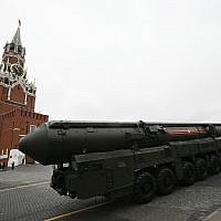 In this Tuesday, May 9, 2017 file photo, Russian Topol M intercontinental ballistic missile launcher rolls along Red Square during the Victory Day military parade to celebrate 72 years since the end of WWII and the defeat of Nazi Germany, in Moscow, Russia. Russia says it has met the nuclear arsenal limits of a key arms control treaty but has some issues with U.S. compliance. Monday, Feb. 5, 2018 was the deadline to verify compliance by both the United States and Russia with the New START treaty signed in 2010. (AP Photo/Alexander Zemlianichenko, File)