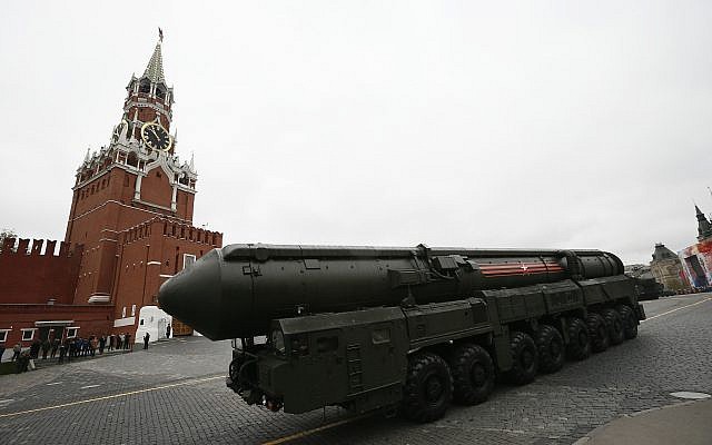 In this Tuesday, May 9, 2017 file photo, Russian Topol M intercontinental ballistic missile launcher rolls along Red Square during the Victory Day military parade to celebrate 72 years since the end of WWII and the defeat of Nazi Germany, in Moscow, Russia. Russia says it has met the nuclear arsenal limits of a key arms control treaty but has some issues with U.S. compliance. Monday, Feb. 5, 2018 was the deadline to verify compliance by both the United States and Russia with the New START treaty signed in 2010. (AP Photo/Alexander Zemlianichenko, File)