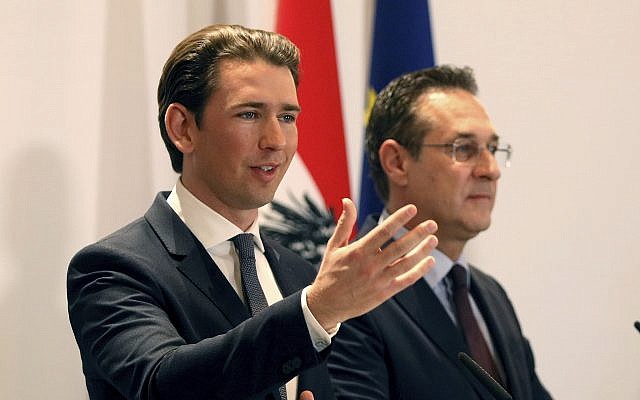 Austria's Chancellor Sebastian Kurz and Austrian Vice Chancellor Heinz-Christian Strache, from left, hold a joint press conference after one year government in Austria in Vienna, Austria, December 4, 2018. (AP Photo/Ronald Zak)
