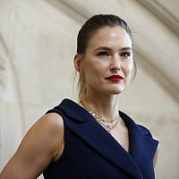 Model Bar Refaeli poses for photographers upon arrival at the Dior ready-to-wear Fall-Winter 2019-2020 collection in Paris, February 26, 2019. (Thibault Camus/AP)