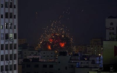 An explosion caused by an Israeli airstrike on a building in Gaza City, Saturday, May 4, 2019. (AP/Khalil Hamra)