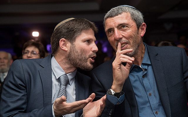 Union of Right-Wing Parties chairman Rafi Peretz (R) and National Union faction chair Bezalel Smotrich at the party's 2019 election campaign launch, March 11, 2019. (Yonatan Sindel/Flash90)