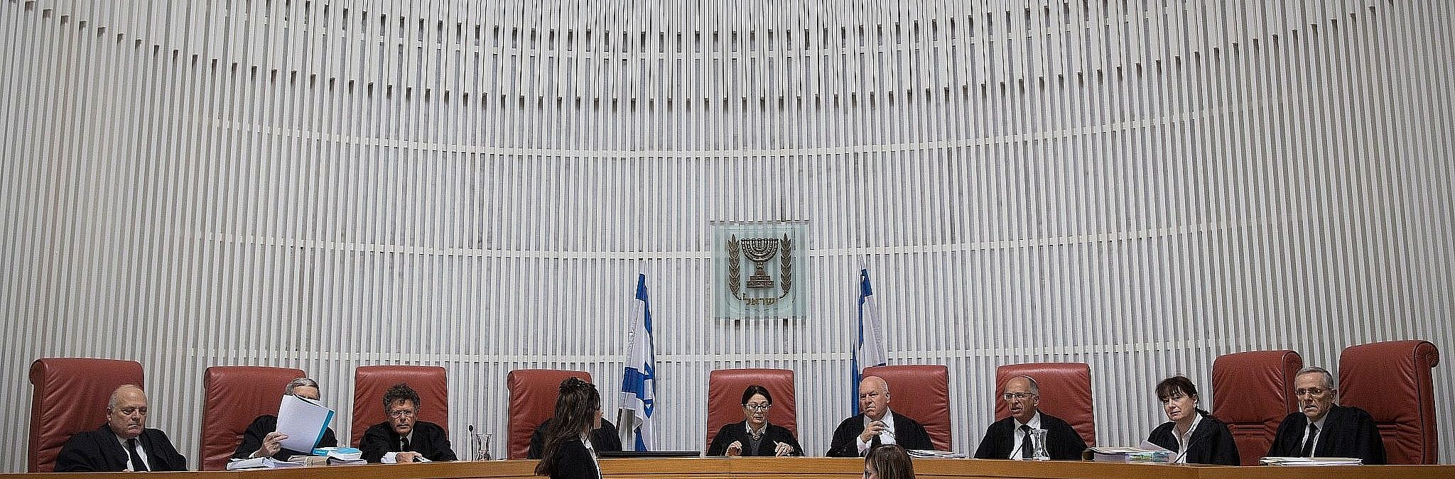 ‎Supreme Court Chief Justice Esther Hayut (C) and other judges on the court, ahead of a hearing on March 14, 2019. (Hadas Parush/ Flash90)