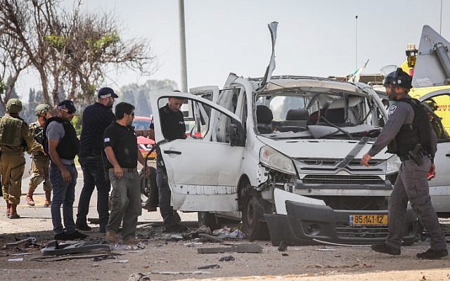 The scene of a car hit by a missile fired from the Gaza Strip near the Israel-Gaza border on May 5, 2019. (Noam Rivkin Fenton/Flash90)