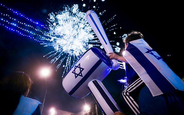 People watch fireworks during a show to mark Israel's 71st Independence Day in Jerusalem on May 8, 2019. (Hadas Parush/Flash90)