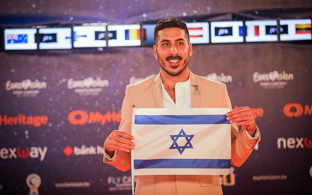 Kobi Marimi, Israel's contestant, walks on the Orange Carpet, during and opening event of the 2019 Eurovision Song Contest, at Habima Square in Tel Aviv, on May 12, 2019. (Hadas Parush/Flash90)