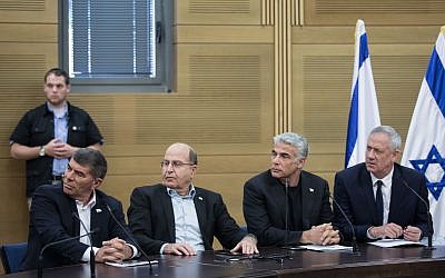Blue and White party leaders (R-L) Benny Gantz, Yair Lapid, Moshe Ya’alon, and Gabi Ashkenazi, during a faction meeting at the Knesset on May 20, 2019. (Hadas Parush /Flash90)