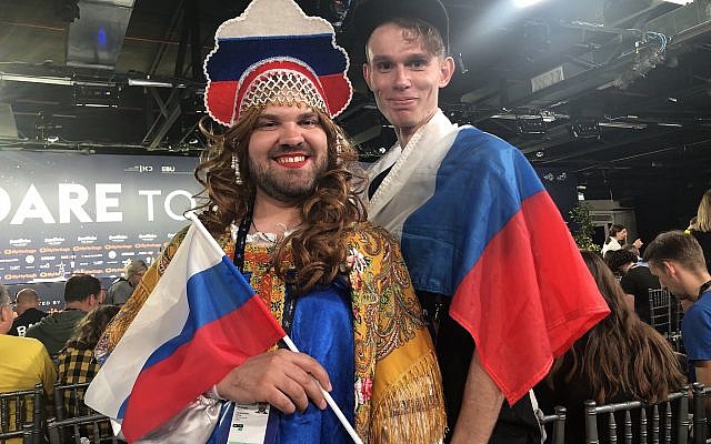 Two Russian fans, dressed in their country's colors for the second semifinal of Eurovision, on Thursday night, May 16, 2019 (Jessica Steinberg/Times of Israel)
