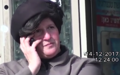 A private investigator tagged Malka Leifer as she spoke on the phone, while sitting on a bench in Bnei Brak, on December 14, 2017. (Screen capture/YouTube)