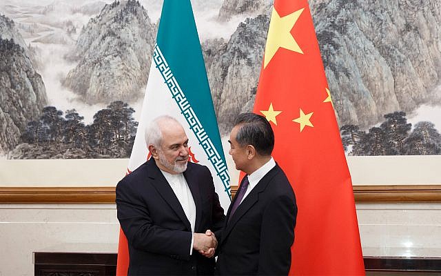 Chinese Foreign Minister Wang Yi, right, meets Iranian Foreign Minister Mohammad Javad Zarif at the Diaoyutai State Guesthouse in Beijing, May 17, 2019. (Thomas Peter/Pool Photo via AP)