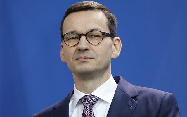 Polish Prime Minister Mateusz Morawiecki listens during a joint press conference with Germany's chancellor, at the Chancellery in Berlin, Germany, on February 16, 2018.  (Michele Tantussi/Getty Images via JTA)