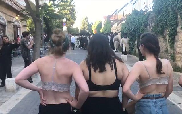 Women who took their tops off at a protest by ultra-Orthodox men in Jerusalem on May 18, 2019. (screenshot)