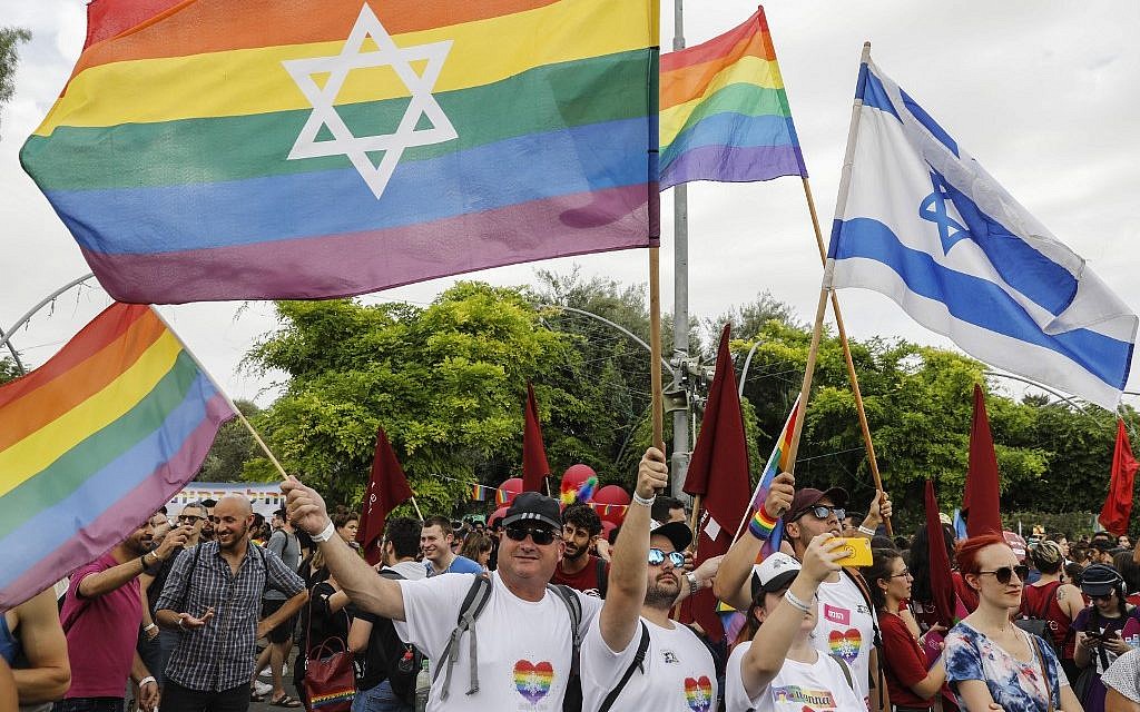 People take part in the 18th annual Jerusalem Gay Pride parade on June 6, 2019. (Menahem Kahana/AFP)