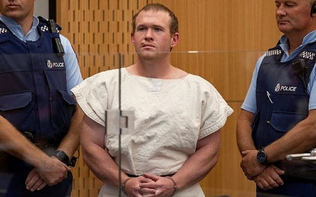 In this picture taken on March 16, 2019, Brenton Tarrant (C), the man charged in relation to the Christchurch massacre, stands in the dock during his appearance at the Christchurch District Court. (Mark Mitchell/Pool/AFP)