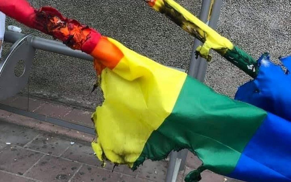 people burning the gay flag