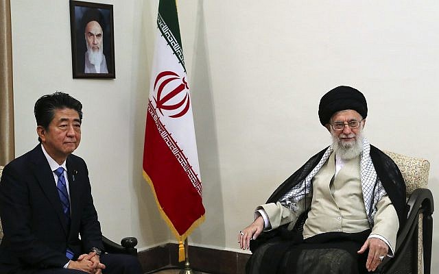 In this picture released by an official website of the office of the Iranian supreme leader, Ayatollah Ali Khamenei, right, meets with Japanese Prime Minister Shinzo Abe, in Tehran, Iran, June 13, 2019. (Office of the Iranian Supreme Leader via AP)
