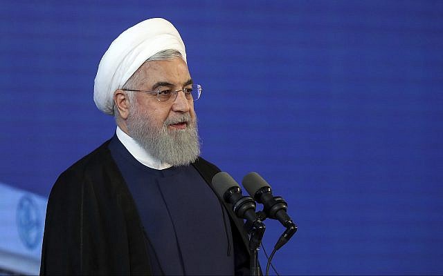 In this photo released by an official website of the office of the Iranian Presidency, Iranian President Hassan Rouhani speaks in a ceremony at Imam Khomeini International Airport, south of the capital Tehran on June 18, 2019. (Iranian Presidency Office via AP)