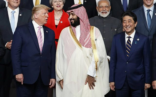 Illustrative: US President Donald Trump, left, speaks with Saudi Arabia's Crown Prince Mohammed bin Salman during family photo session at G-20 leaders summit in Osaka, Japan, June 28, 2019. (Kim Kyung-Hoon/Pool Photo via AP)