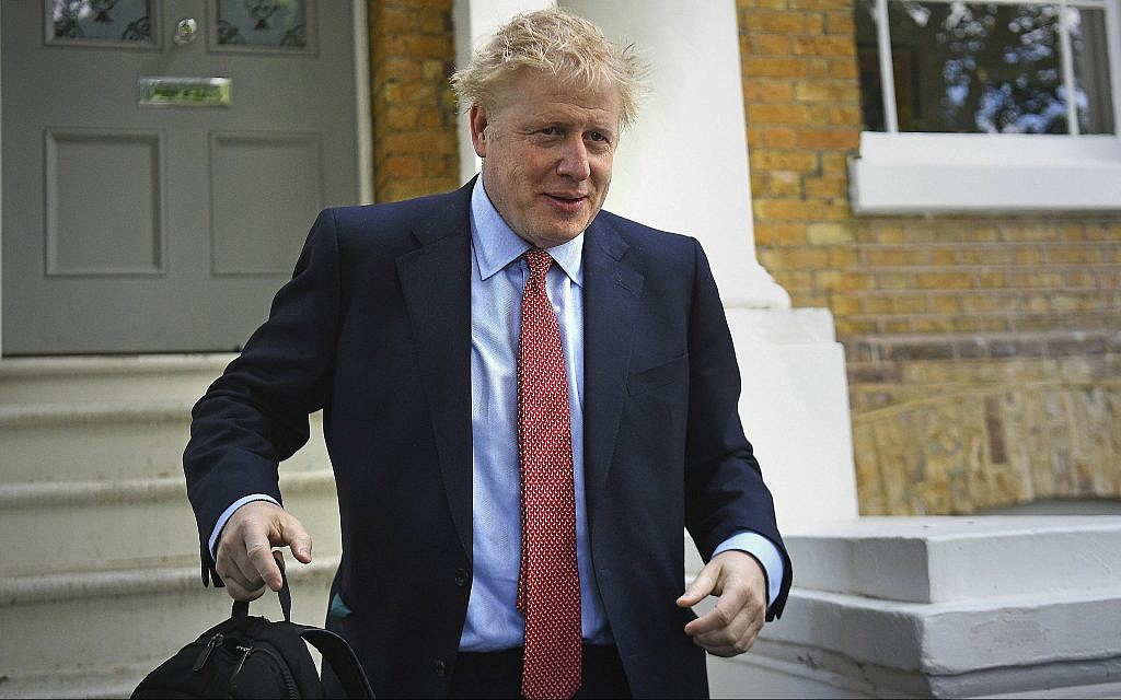 Britain's former Foreign Secretary Boris Johnson leaves his home in London, Friday June 21, 2019. (Kirsty O'Connor/PA via AP)